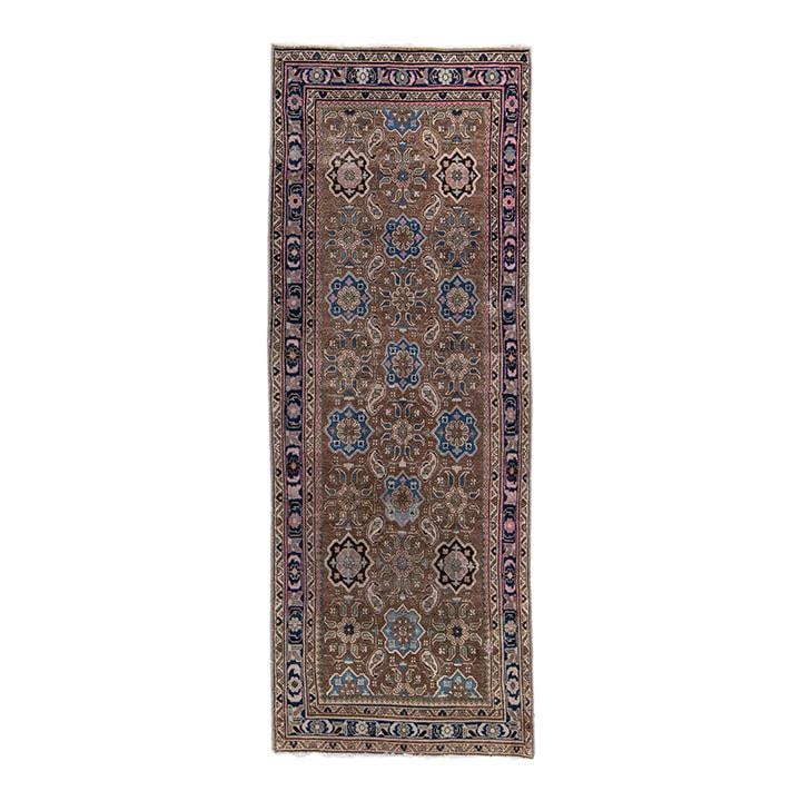 1960s Vintage Persian Handmade Wool Runner Brown Floral Design 3'4" x 9'0": 1960s Vintage Persian Handmade Wool Runner Brown Floral Design 3'4" x 9'0" This exquisite vintage Persian handmade runner features a beautiful brown field adorned with blue and pink accents. The geome