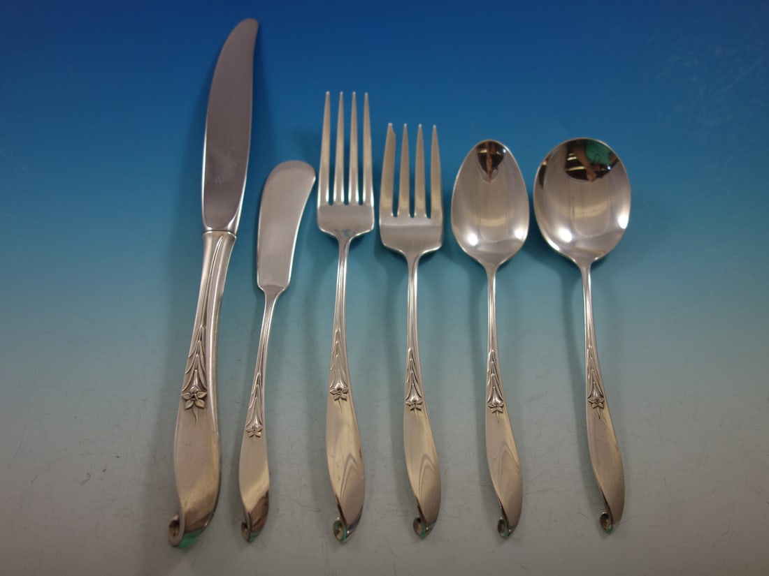 Wallace Wishing Star Sterling Silver Flatware Set for 12 80 Pieces: Wallace Wishing Star Sterling Silver Flatware Set for 12 80 Pieces Elevate your dining experience with the exquisite Wishing Star Sterling Silver Flatware Set by Wallace. This post-1940 set is designe