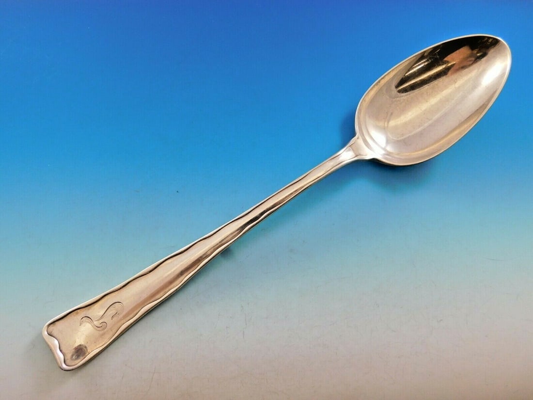 Tiffany & Co. Sterling Silver Stuffing Spoon 12 1/8 Lap Over Edge Pattern: Tiffany & Co. Sterling Silver Stuffing Spoon 12 1/8 Lap Over Edge Pattern This exquisite sterling silver stuffing spoon, crafted by Tiffany & Co. in the elegant Lap Over Edge pattern, measures 12 1/8