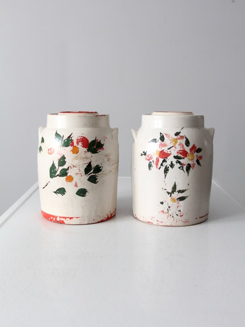 Vintage 1930s Pair of Hand-Painted Stoneware Cookie Jars: Vintage 1930s Pair of Hand-Painted Stoneware Cookie Jars This charming set of two vintage stoneware cookie jars, dating back to the 1930s - 1940s, features a delightful hand-painted floral design comp