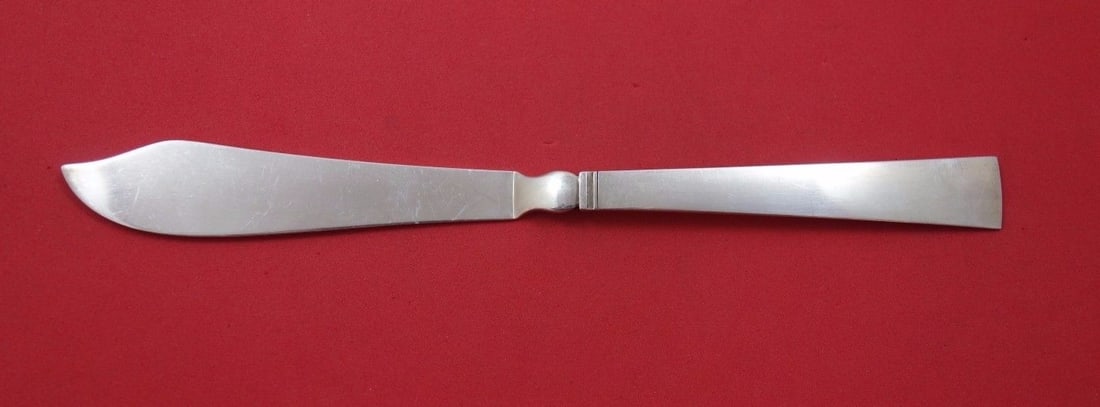 Georg Jensen Blok Acadia Sterling Silver Fish Knife 8 1/4": Georg Jensen Blok Acadia Sterling Silver Fish Knife 8 1/4" Experience the elegance of the Blok - Acadia fish knife by Georg Jensen, crafted from high-quality sterling silver. This exquisite piece feat