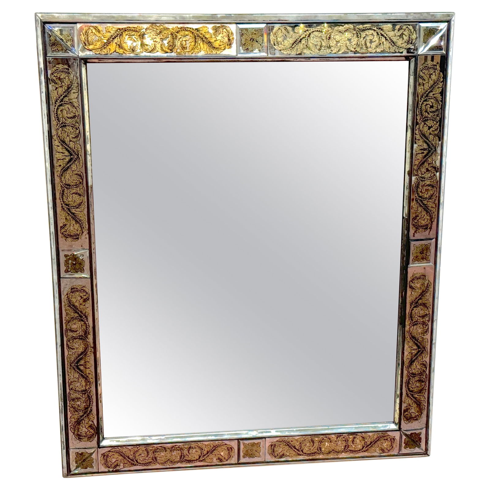 Maison Jansen Eglomise Gilt Neoclassical Floral Mirror 47 x 41: Maison Jansen Eglomise Gilt Neoclassical Floral Mirror 47 x 41 This exquisite mirror, attributed to Maison Jansen, showcases a masterful blend of neoclassical design and modern elegance. Measuring 47