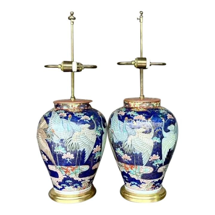 Pair of Vintage Asian Glazed Ceramic Crane Lamps in Ink Blue: Pair of Vintage Asian Glazed Ceramic Crane Lamps in Ink Blue Elevate your home decor with this exquisite pair of Vintage Asian Glazed Ceramic Crane Lamps. Featuring intricately designed ceramic bases