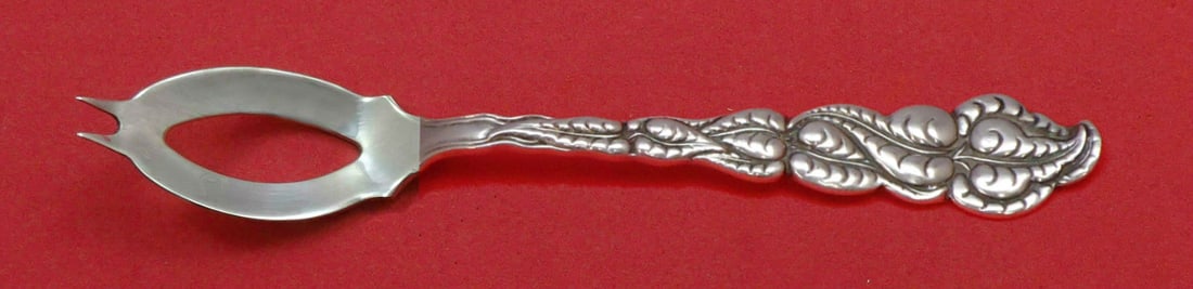 Tiffany and Co Ailanthus Sterling Silver Olive Spoon 5.5 Custom Made: Tiffany and Co Ailanthus Sterling Silver Olive Spoon 5.5 Custom Made This exquisite olive spoon from Tiffany and Co. showcases the elegant Ailanthus pattern, crafted from high-quality sterling silver.