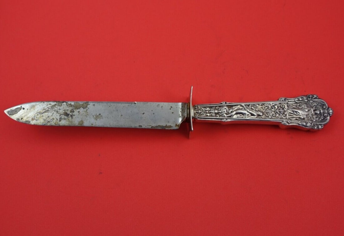 Gorham Coligni Sterling Silver Roast Carving Knife 12 Inch: Gorham Coligni Sterling Silver Roast Carving Knife 12 Inch This exquisite roast carving knife is part of the Coligni pattern by Gorham, crafted from sterling silver (.925) with a hollow handle and a d