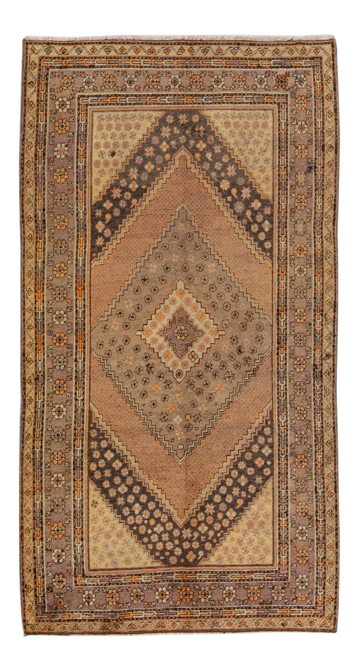 Antique Khotan Hand-Knotted Tan Wool Rug 5'7" x 10'7" Medallion Design: Antique Khotan Hand-Knotted Tan Wool Rug 5'7" x 10'7" Medallion Design Explore the beauty of this antique Khotan hand-knotted wool rug, featuring a warm tan field adorned with an intricate all-over me