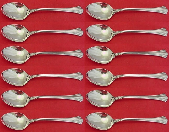 Reed and Barton Eighteenth Century Sterling Silver 12 Piece Spoon Set: Reed and Barton Eighteenth Century Sterling Silver 12 Piece Spoon Set This exquisite 12-piece set of place soup spoons features the elegant Eighteenth Century pattern by Reed & Barton, crafted from hi