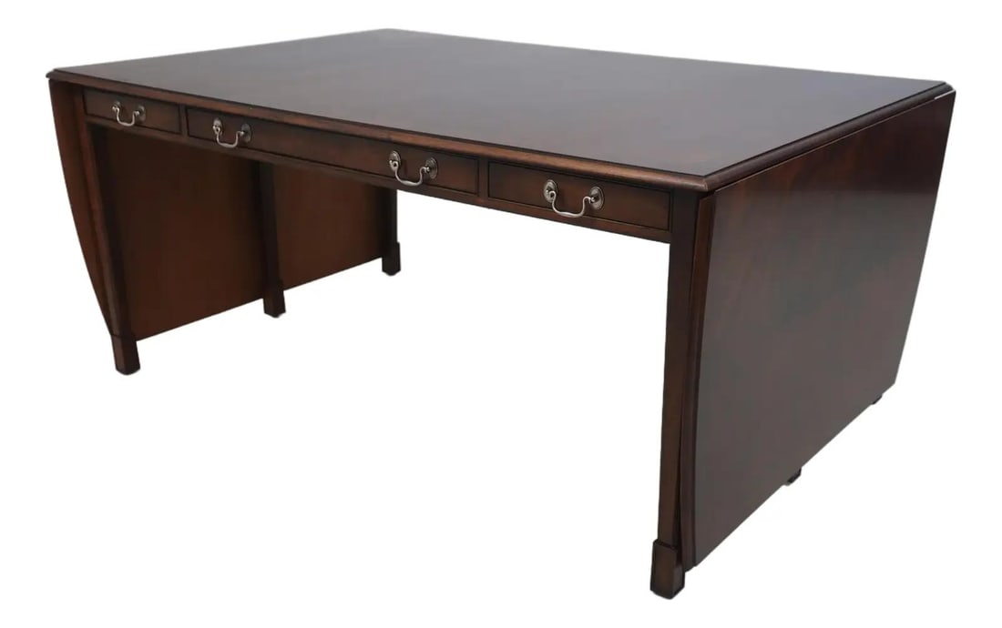 Elegant Mahogany Drop Side Partners Desk with Brass Hardware: Elegant Mahogany Drop Side Partners Desk with Brass Hardware This exquisite mahogany drop side partners desk table combines functionality with elegant design. Crafted around 40 years ago, it features