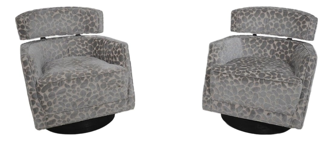 Set of Two Modern Swivel Lounge Chairs with Barrel Backrests: Set of Two Modern Swivel Lounge Chairs with Barrel Backrests This pair of Caracole Modern swivel chairs features a contemporary design with barrel-shaped backrests and exposed wood rails. Constructed