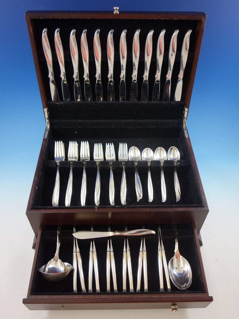 International Sterling Silver Pine Spray Flatware Set 65 Pieces Service 12: International Sterling Silver Pine Spray Flatware Set 65 Pieces Service 12 Elevate your dining experience with the exquisite Pine Spray flatware set by International Sterling Silver. This remarkable 6