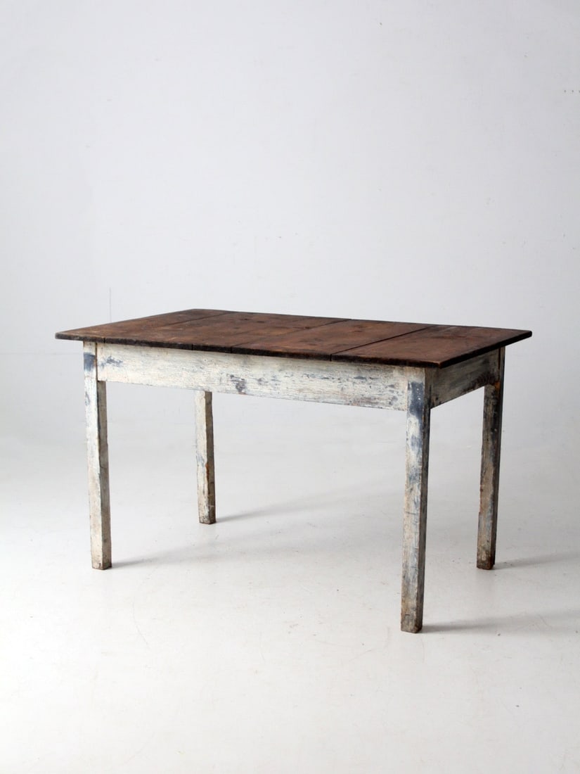 Early 1900s Painted Farmhouse Table With Dark Wood Top: Early 1900s Painted Farmhouse Table With Dark Wood Top This early 20th-century farmhouse table features a dark wood top paired with a painted base in chalky white and blue tones. Its clean, uncomplica