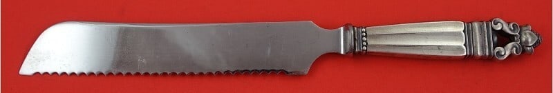 Georg Jensen Acorn Sterling Silver Bread Knife 11" Wide Serrated GI Mark: Georg Jensen Acorn Sterling Silver Bread Knife 11" Wide Serrated GI Mark This stunning bread knife from the Acorn pattern by Georg Jensen features a wide serrated blade, expertly crafted from sterling