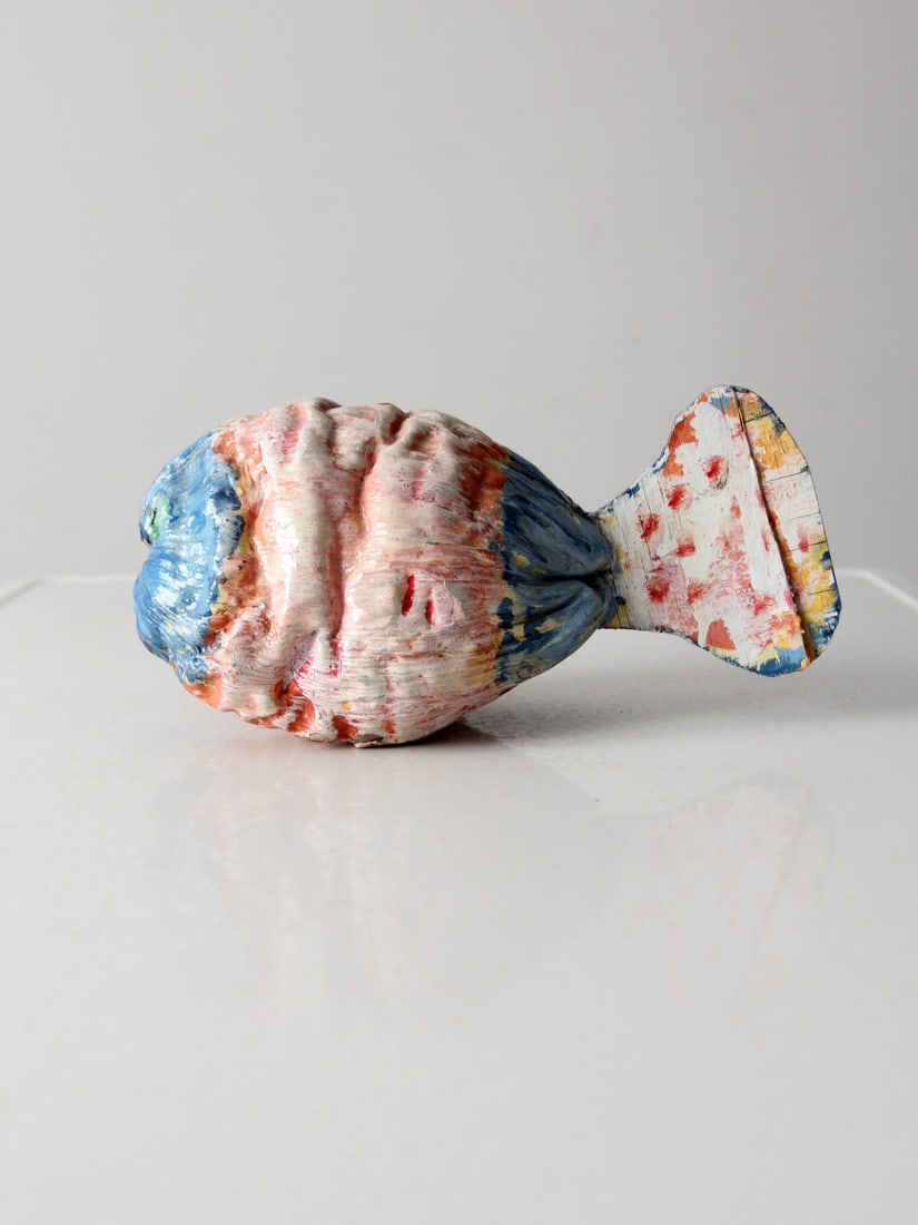 Whimsical Vintage Handmade Fish Sculpture Folk Art Decor: Whimsical Vintage Handmade Fish Sculpture Folk Art Decor This charming vintage handmade fish sculpture showcases a textured surface adorned with whimsical, naive-style paint in vibrant shades of white