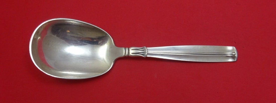 Lotus Pattern Sterling Silver Serving Spoon by W and S Sorensen 8": Lotus Pattern Sterling Silver Serving Spoon by W and S Sorensen 8" This exquisite 8" serving spoon, crafted from sterling silver, features the elegant Lotus pattern by W and S Sorensen. The spoon is i