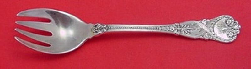 Tiffany & Co Saint James Sterling Silver Ice Cream Fork 5 5/8": Tiffany & Co Saint James Sterling Silver Ice Cream Fork 5 5/8" Discover the exquisite Saint James ice cream fork by Tiffany & Co., crafted from high-quality sterling silver. This original piece, measu