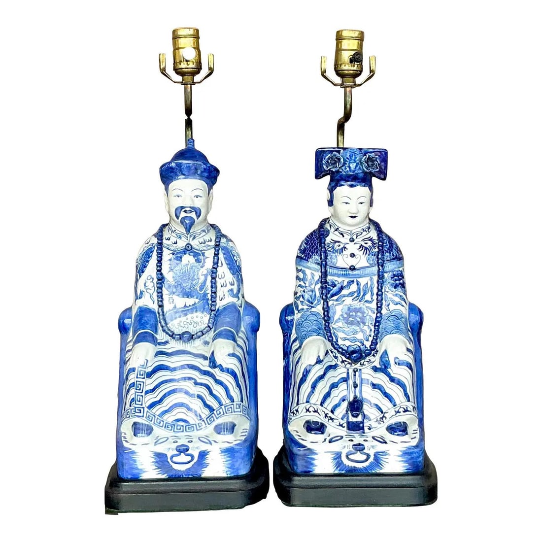 Pair of Vintage Asian Blue and White Emperor Lamps: Pair of Vintage Asian Blue and White Emperor Lamps Enhance your decor with this stunning pair of vintage Asian emperor lamps, beautifully crafted in a timeless blue and white color scheme. Each lamp f