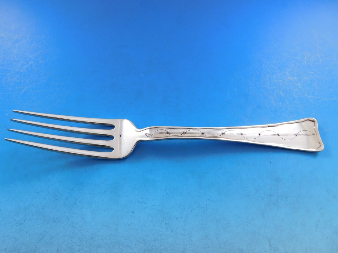 Tiffany & Co. Lap Over Edge Sterling Silver Dinner Fork 8" Star Design: Tiffany & Co. Lap Over Edge Sterling Silver Dinner Fork 8" Star Design This exquisite dinner fork features the iconic Lap Over Edge pattern, crafted by Tiffany & Co. Made from high-quality sterling si