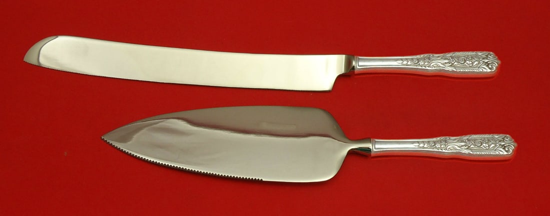 Milburn Rose Westmorland Sterling Silver Wedding Cake Set 2pc: Milburn Rose Westmorland Sterling Silver Wedding Cake Set 2pc This exquisite Milburn Rose wedding cake set by Westmorland features a beautifully designed sterling silver knife and cake server. The set