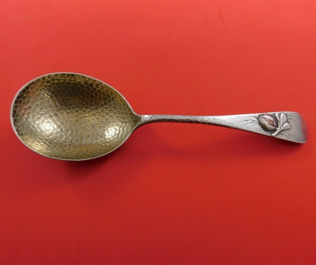Whiting Mixed Metals Sterling Silver Berry Spoon Pomegranate 8 3/8": Whiting Mixed Metals Sterling Silver Berry Spoon Pomegranate 8 3/8" This exquisite serving spoon hails from the renowned Whiting brand and features a stunning Mixed Metals pattern. Crafted from sterli