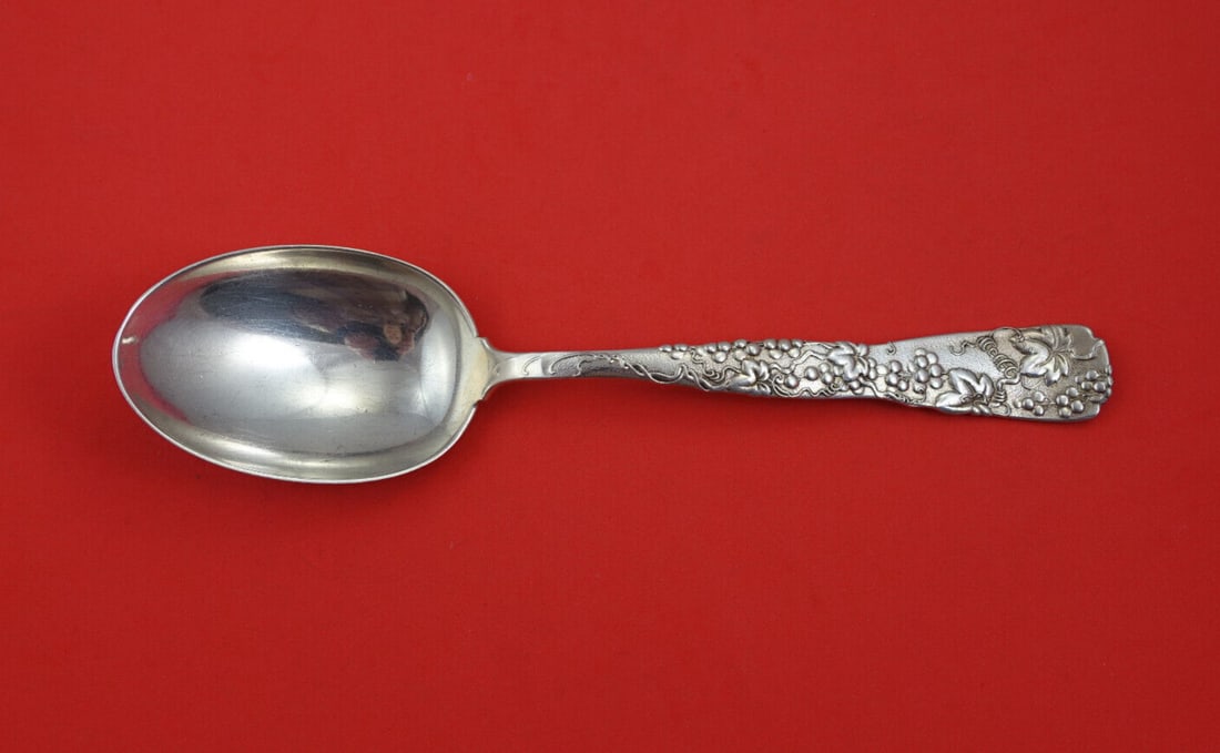 Tiffany Vine Sterling Silver Serving Spoon 9.5" Grapevine Motif: Tiffany Vine Sterling Silver Serving Spoon 9.5" Grapevine Motif Discover the exquisite Vine by Tiffany Sterling Silver Vegetable Serving Spoon, a timeless piece from Tiffany & Co. This stunning spoon,
