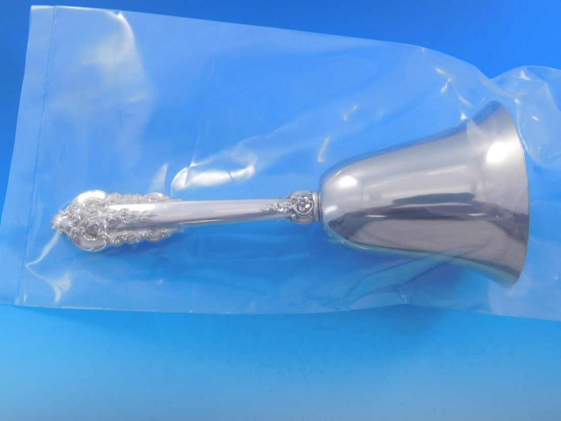 Wallace Grande Baroque Sterling Silver Custom Dinner Bell 7 1/4": Wallace Grande Baroque Sterling Silver Custom Dinner Bell 7 1/4" This exquisite dinner bell features the elegant Grande Baroque pattern by Wallace. Crafted from sterling silver with a custom-made holl