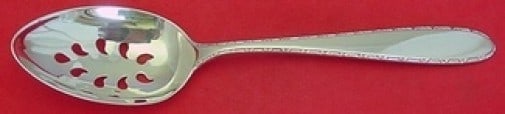 Manchester Sterling Silver Custom 8 Inch Pierced Serving Spoon: Manchester Sterling Silver Custom 8 Inch Pierced Serving Spoon This exquisite slotted serving spoon from the Manchester pattern features a pierced design and measures 8 inches in length. Crafted from