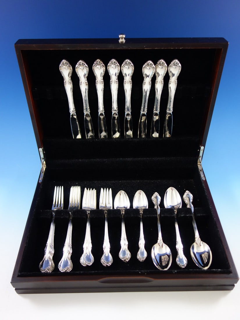 Alvin Pirouette Sterling Silver Flatware Set for 8 with 40 Pieces and Storage Chest: Alvin Pirouette Sterling Silver Flatware Set for 8 with 40 Pieces and Storage Chest This exquisite Pirouette flatware set by Alvin is crafted from high-quality sterling silver and features a classic d