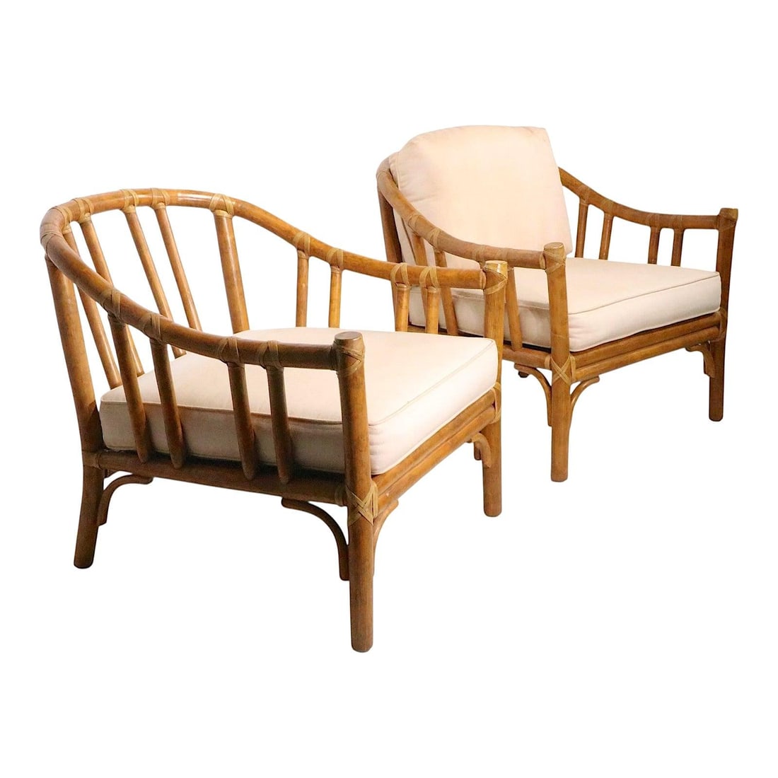 Vintage McGuire Bamboo Lounge Chairs Pair 1970s San Francisco: Vintage McGuire Bamboo Lounge Chairs Pair 1970s San Francisco This exceptional pair of bamboo style lounge chairs, crafted by McGuire in the 1970s, showcases elegant design with curved continuous side
