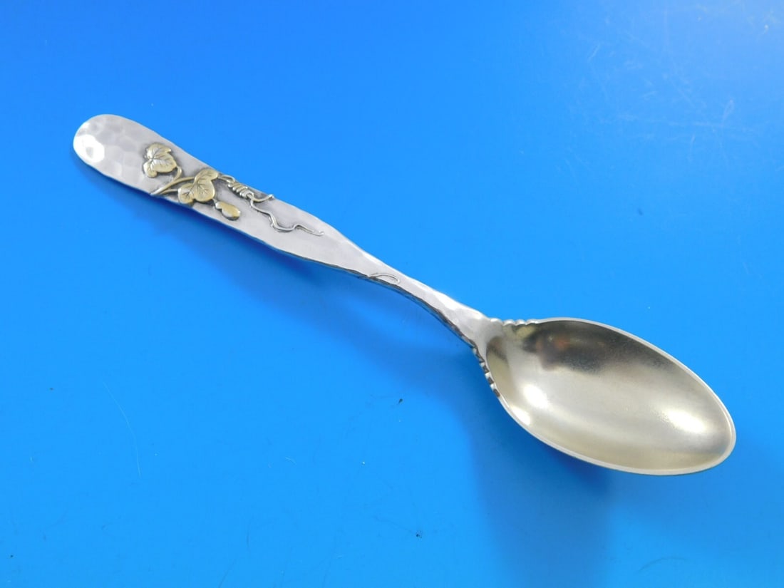 Tiffany & Co. Lap Over Edge Mixed Metals Sterling Silver Coffee Spoon: Tiffany & Co. Lap Over Edge Mixed Metals Sterling Silver Coffee Spoon This exquisite coffee spoon from Tiffany & Co. features the elegant 'Lap Over Edge Mixed Metals' pattern. Crafted from sterling si