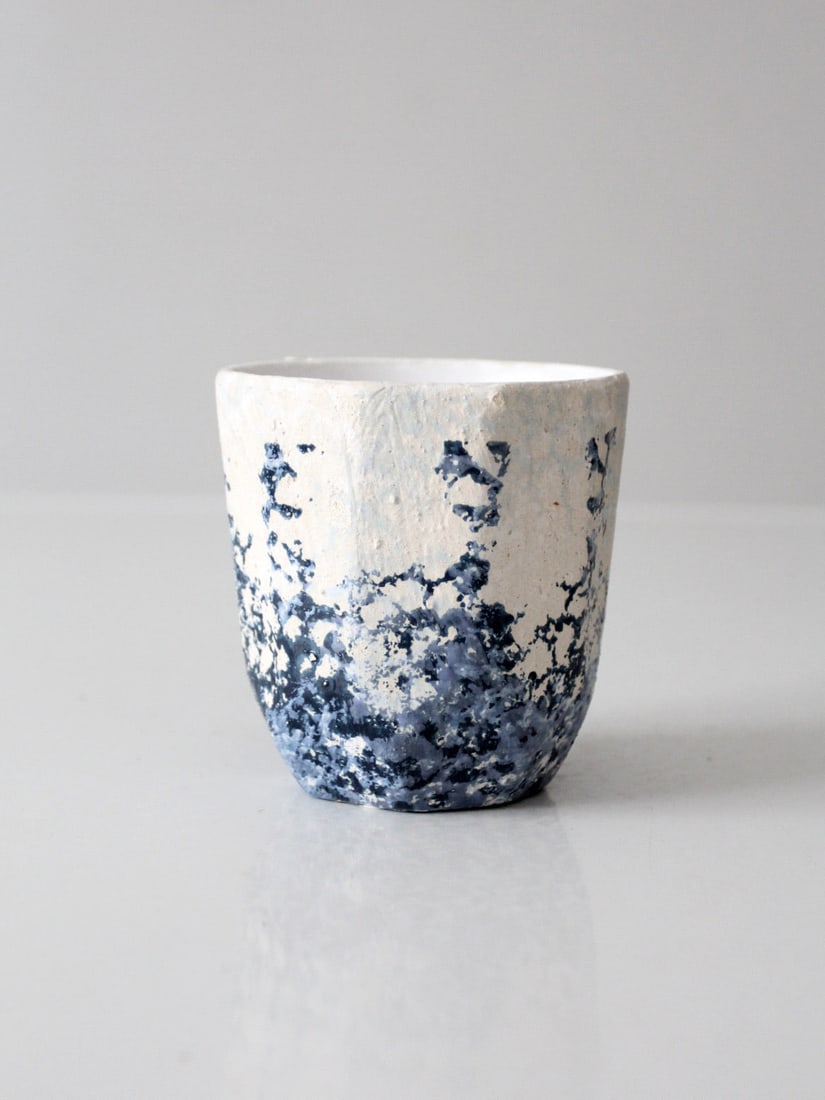 Artisanal Vintage Studio Pottery Vase Blue Ivory Glaze 4 Inch: Artisanal Vintage Studio Pottery Vase Blue Ivory Glaze 4 Inch This vintage studio pottery vase showcases a beautifully textured form with a marbled blue and ivory glaze, reminiscent of seafoam against