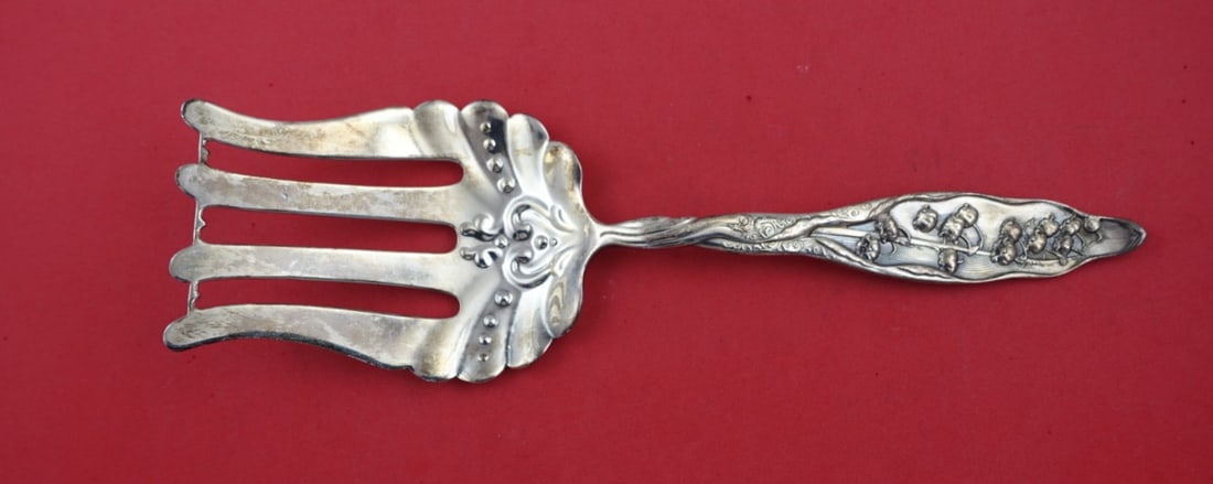 Whiting Sterling Silver Asparagus Fork Lily of the Valley 9.5 Inch Fancy Design: Whiting Sterling Silver Asparagus Fork Lily of the Valley 9.5 Inch Fancy Design This exquisite asparagus fork is crafted from sterling silver and features the elegant "Lily of the Valley" pattern by W