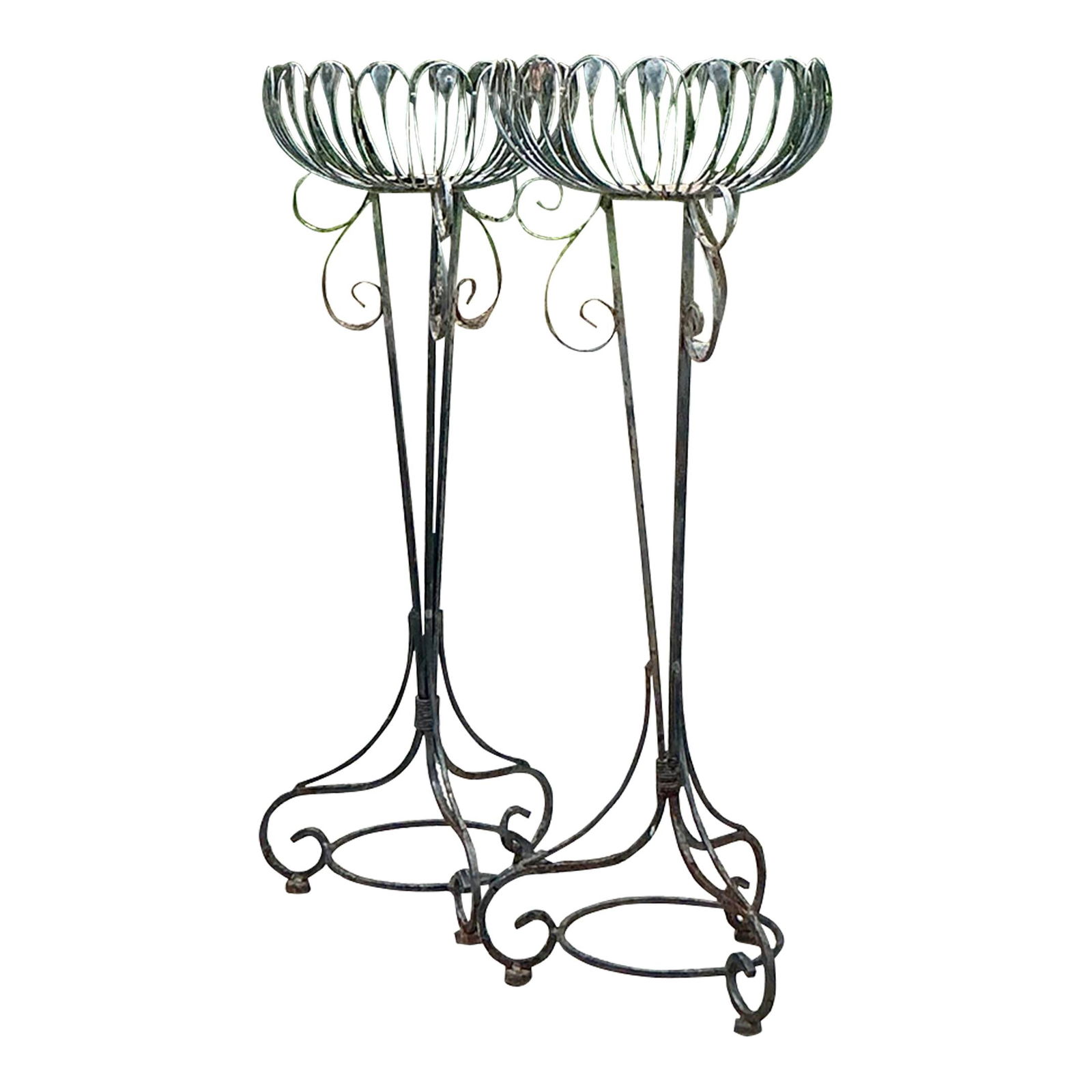 Pair of Vintage MCM Wrought Iron Plant Stands Onyx Color: Pair of Vintage MCM Wrought Iron Plant Stands Onyx Color Elevate your greenery with this pair of Vintage Mid-Century Modern Wrought Iron Plant Stands. Showcasing a sleek design and crafted from durabl