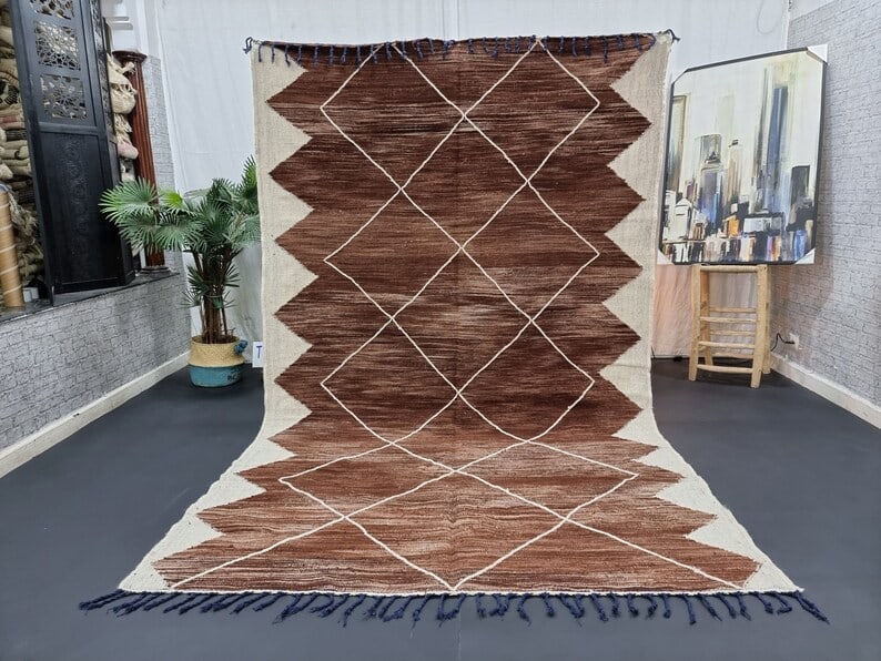 Handwoven Moroccan Rug 10 x 5 Feet 100% Sheep Wool: Handwoven Moroccan Rug 10 x 5 Feet 100% Sheep Wool This elegant authentic rug is handwoven by local Berber women weavers in the Atlas Mountains of Morocco, utilizing traditional tools and natural loca