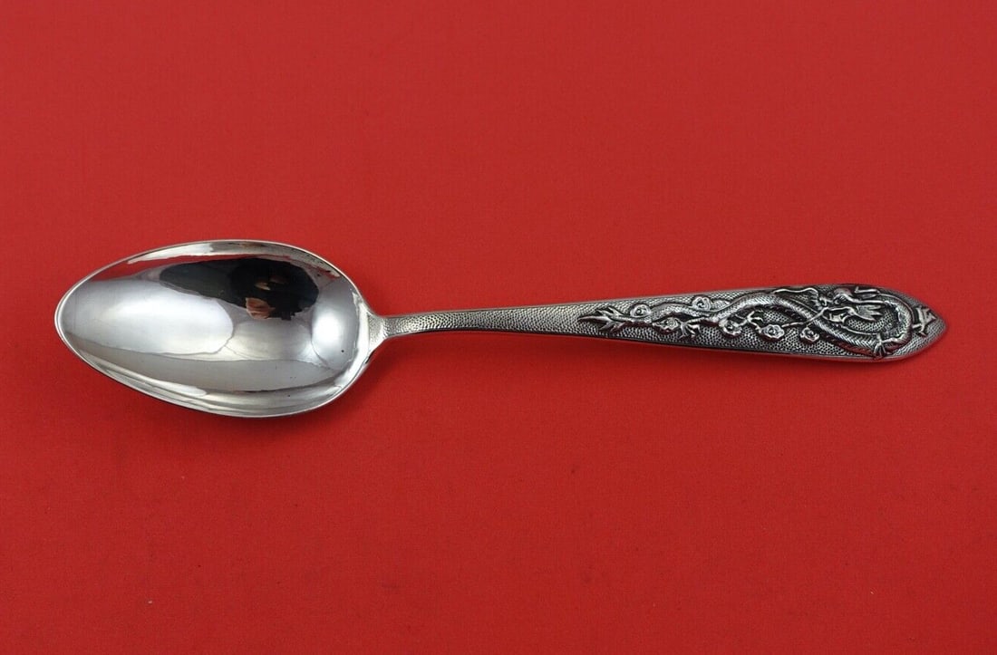 Chinese Sterling Silver Serving Spoon 8 Dragon Design by The Ling: Chinese Sterling Silver Serving Spoon 8 Dragon Design by The Ling This exquisite serving spoon is crafted from Chinese sterling silver, featuring a detailed dragon design by The Ling. The spoon measur