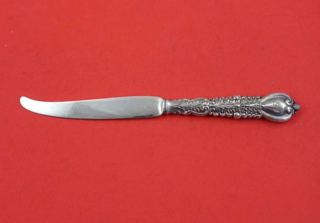 Tiffany & Co. Florentine Sterling Silver Dessert Knife 7 5/8": Tiffany & Co. Florentine Sterling Silver Dessert Knife 7 5/8" This exquisite dessert knife from the Florentine pattern by Tiffany & Co. features a hollow handle made entirely of sterling silver. Measu