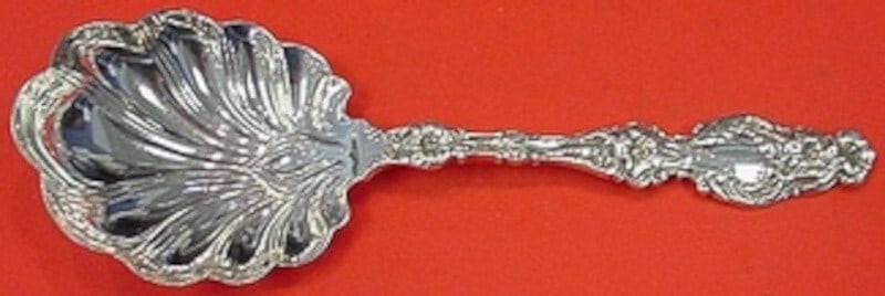 Whiting Lily Sterling Silver Preserve Spoon 7.5 Inch Serving Utensil: Whiting Lily Sterling Silver Preserve Spoon 7.5 Inch Serving Utensil Presenting a stunning serving spoon from the renowned Whiting company, featuring the exquisite Lily pattern. This sterling silver p