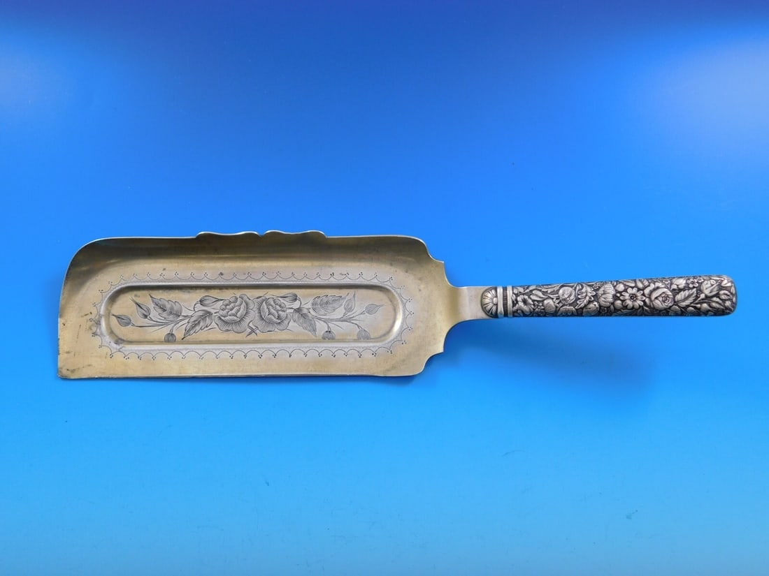 Towle Arlington Sterling Silver Crumber 10 3/4 Gold Wash Roses: Towle Arlington Sterling Silver Crumber 10 3/4 Gold Wash Roses This exquisite crumber is part of the Arlington pattern by Towle, crafted from sterling silver with a hollow handle. Measuring 10 3/4 inc