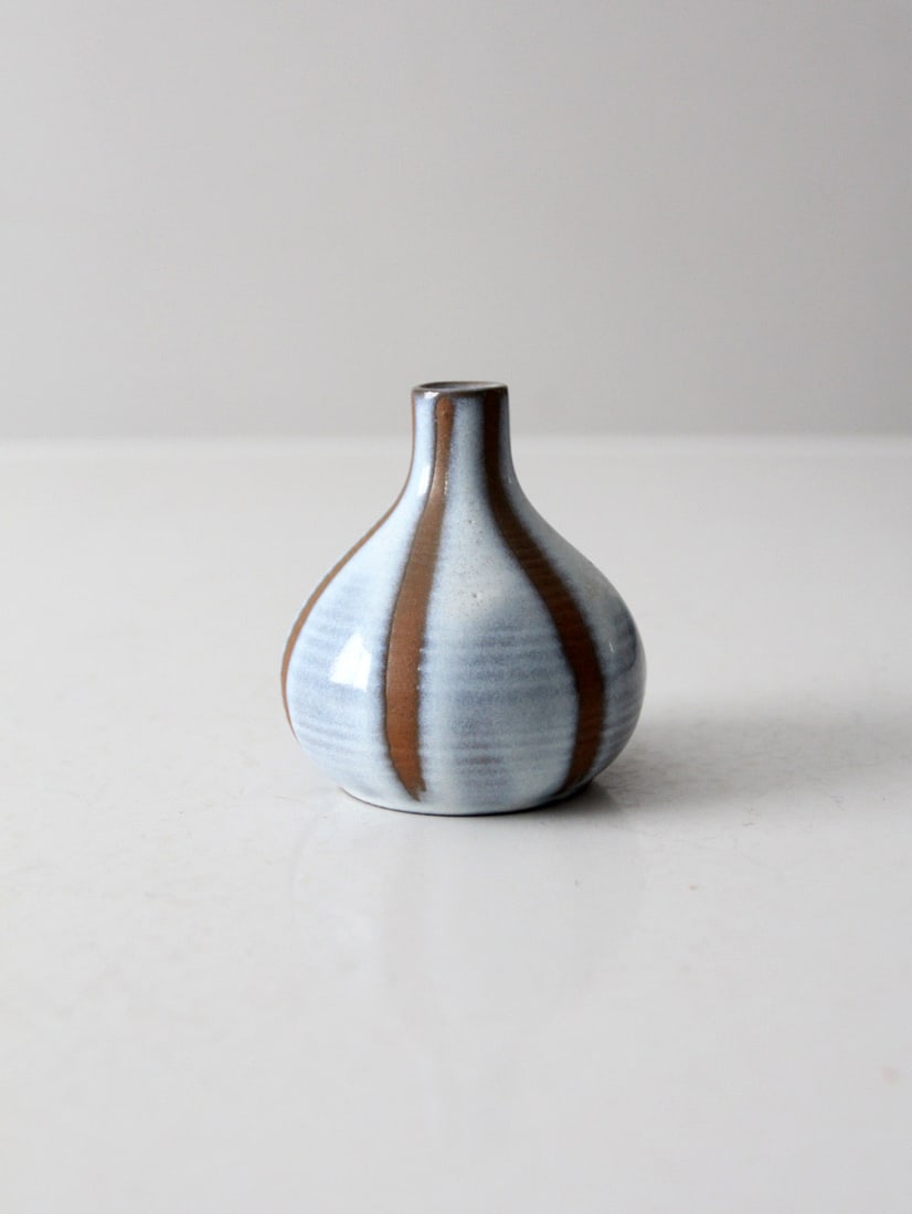 Handmade Blue Gray Glazed Studio Ceramic Vase with Exposed Clay Bands: Handmade Blue Gray Glazed Studio Ceramic Vase with Exposed Clay Bands This handmade studio pottery vase has a softly rounded body with a bottle-neck silhouette. The blue-gray glaze flows gently across