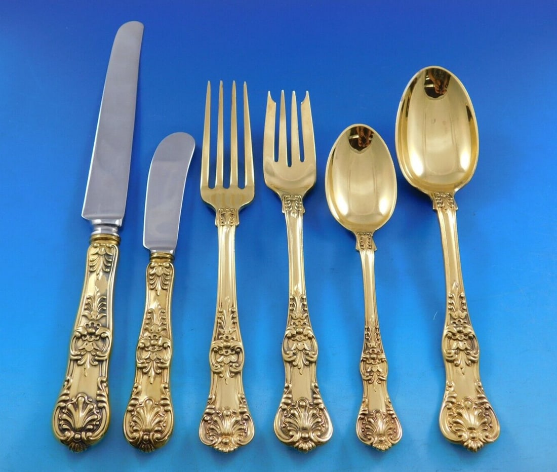 Tiffany & Co English King Vermeil Flatware Set 48 pcs with Storage Chest: Tiffany & Co English King Vermeil Flatware Set 48 pcs with Storage Chest Elevate your dining experience with the English King Gold flatware set by Tiffany & Co. This exquisite collection features 48 p