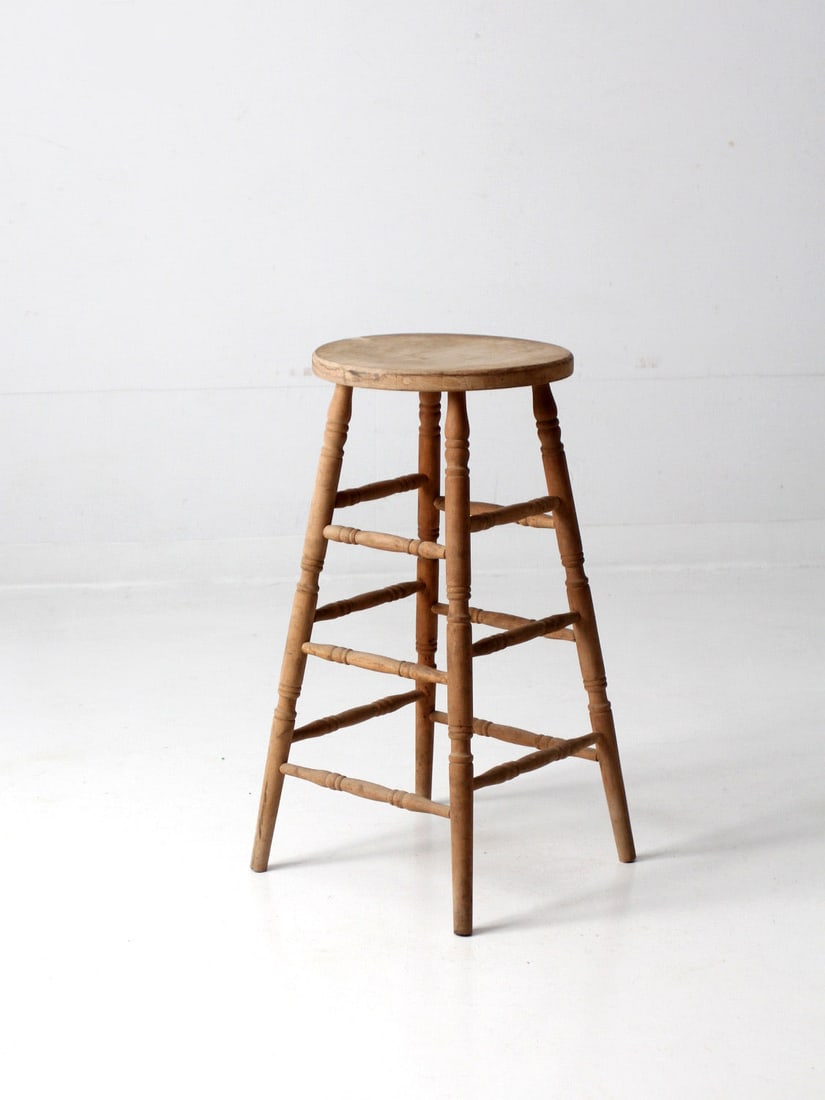 Rustic Antique Wooden Farmhouse Bar Stool 29 inches: Rustic Antique Wooden Farmhouse Bar Stool 29 inches This antique wooden farmhouse stool showcases a unique character, perfect for enhancing any rustic decor. The bar height stool features elegantly tu
