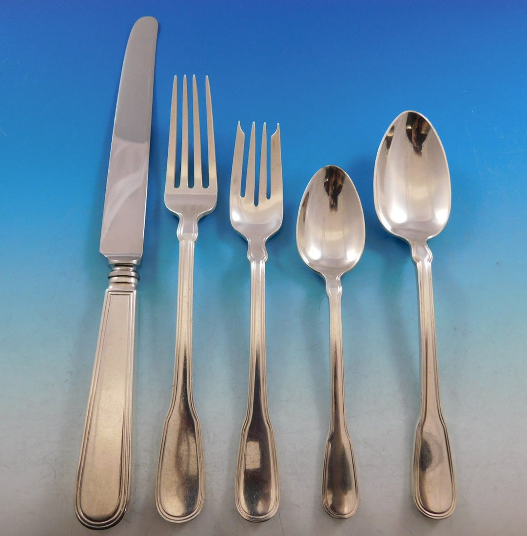 Tiffany & Co Hamilton Gramercy Sterling Silver Flatware Set 40 pcs: Tiffany & Co Hamilton Gramercy Sterling Silver Flatware Set 40 pcs Elevate your dining experience with the Hamilton Gramercy Sterling Silver Flatware Set by Tiffany & Co. This exquisite set features 4