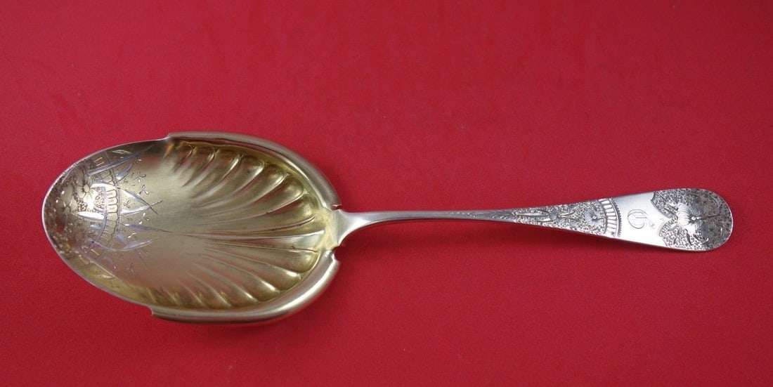 Vansant Sterling Silver Floral Berry Spoon Gold Washed 9 1/4 Inch: Vansant Sterling Silver Floral Berry Spoon Gold Washed 9 1/4 Inch This exquisite berry spoon, crafted by Vansant, showcases a stunning floral motif. Made from sterling silver and featuring a gold-wash