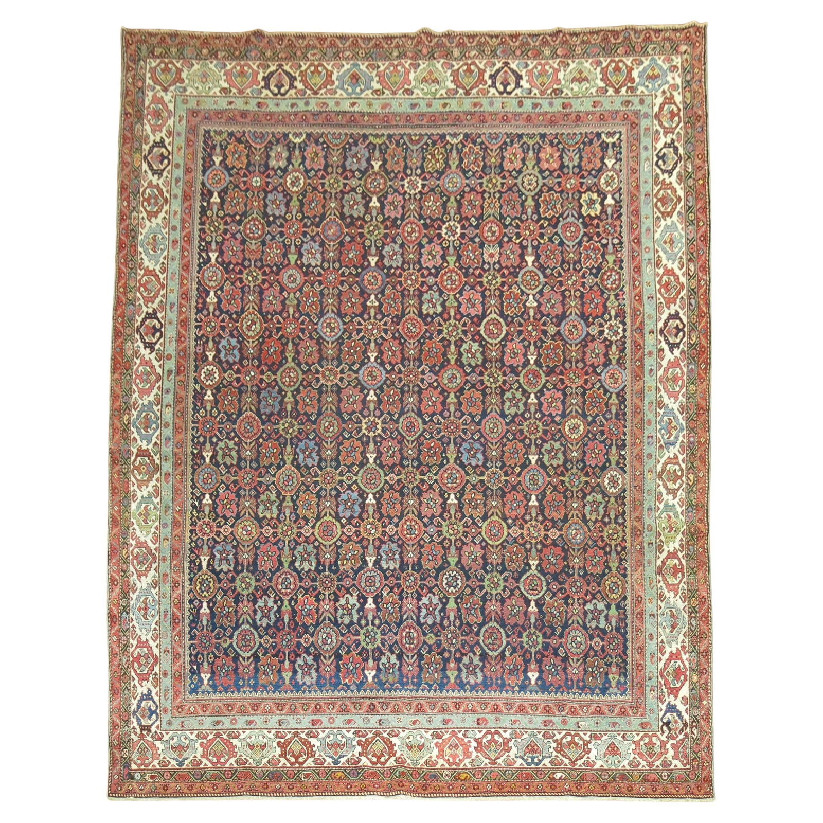 Early 20th Century Persian Malayer Hand-Woven Wool Rug 8'9 x 11'1: Early 20th Century Persian Malayer Hand-Woven Wool Rug 8'9 x 11'1 This exquisite Persian Malayer room-sized rug showcases a beautiful mini Khani design set against a rich navy background. Hand-woven f