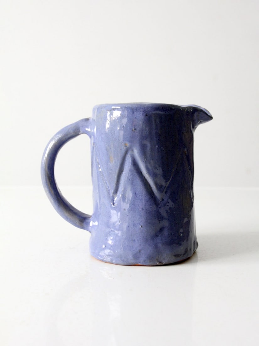 1980s Vintage Studio Pottery Pitcher Periwinkle Blue Signed Art: 1980s Vintage Studio Pottery Pitcher Periwinkle Blue Signed Art This vintage 1980s studio pottery pitcher is a stunning functional art piece, perfect for holding beverages or showcasing flowers as a v