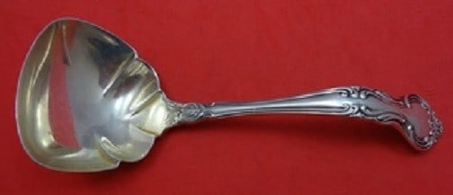 Manchester Amaryllis Sterling Silver Gravy Ladle 6 Inch Serving: Manchester Amaryllis Sterling Silver Gravy Ladle 6 Inch Serving Elevate your dining experience with this exquisite Amaryllis Gravy Ladle, crafted by Manchester. This 6-inch serving ladle is made of hi