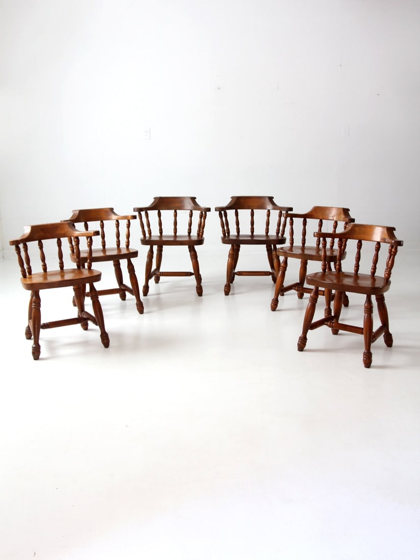 1970s Vintage Tavern Chairs Set of 6 Classic Pub Style: 1970s Vintage Tavern Chairs Set of 6 Classic Pub Style Enhance your dining experience with this set of six vintage tavern chairs, dating back to the 1970s. These chairs feature a classic pub-style des