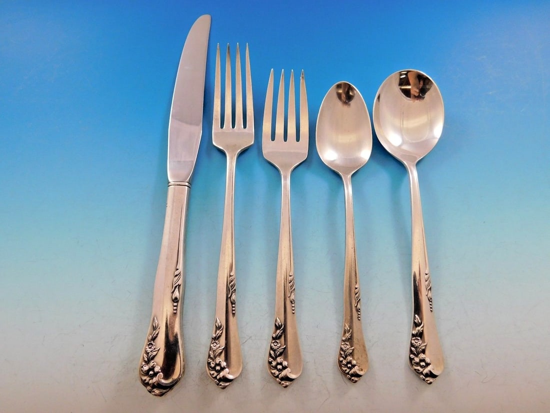 Oneida Engagement Sterling Silver Flatware Set for 6 - 34 Pieces: Oneida Engagement Sterling Silver Flatware Set for 6 - 34 Pieces Elevate your dining experience with this exquisite Engagement flatware set by Oneida, crafted from high-quality sterling silver. This 3
