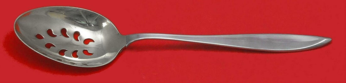 Gorham Esprit Sterling Silver 9-Hole Slotted Serving Spoon 8 3/4": Gorham Esprit Sterling Silver 9-Hole Slotted Serving Spoon 8 3/4" This exquisite Esprit by Gorham sterling silver serving spoon features a custom design with nine pierced holes, making it both functio