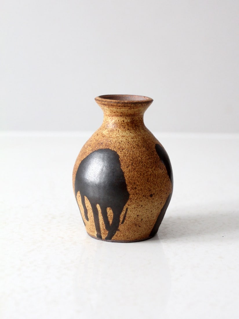 Signed Vintage Studio Pottery Bud Vase Ochre Black Glaze 4.5 Inch: Signed Vintage Studio Pottery Bud Vase Ochre Black Glaze 4.5 Inch This vintage handmade studio pottery bud vase showcases a unique design with a captivating ochre and black glaze featuring a dripped e