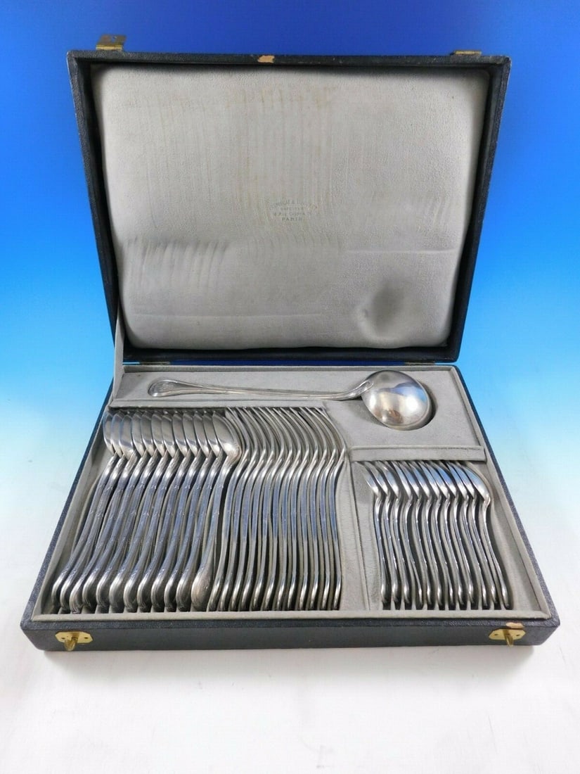 Puiforcat Bougainville Sterling Silver Flatware Set 37 pcs: Puiforcat Bougainville Sterling Silver Flatware Set 37 pcs The Bougainville flatware set by Puiforcat includes 37 pieces of exquisite sterling silver utensils, showcasing the exceptional craftsmanship